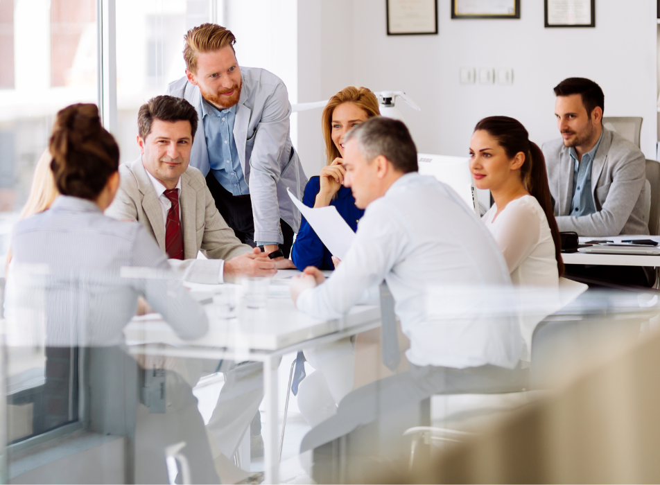 A team of experts discussing business solutions in a meeting room