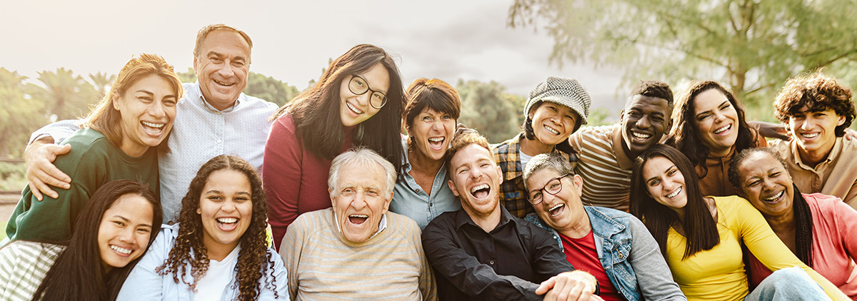 Group of different aging people smiling