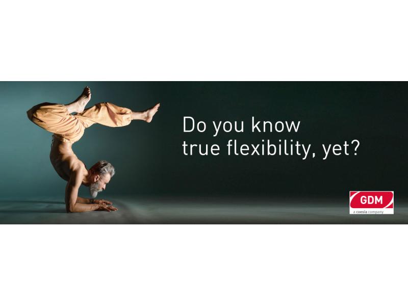 Man doing an inverted yoga position and writing: "Do you know true flexibility, yet?"
