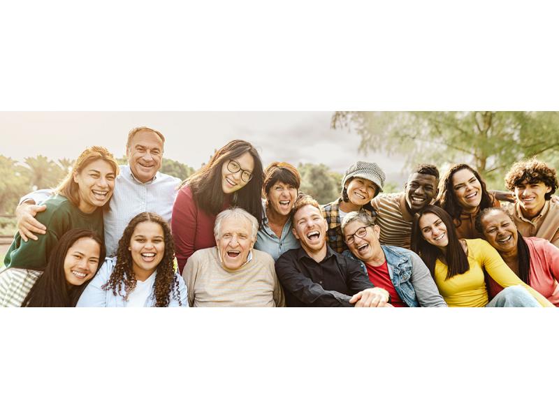 Group of different aging people smiling