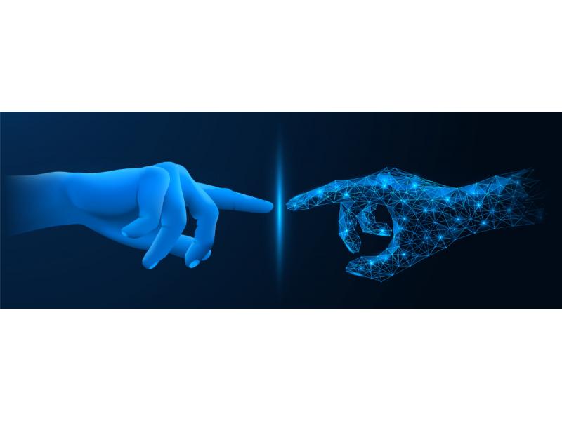 Human hand touching a digital one.